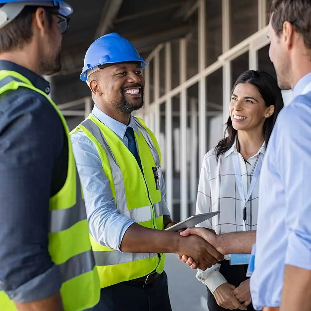 Engineer shaking hands with a client